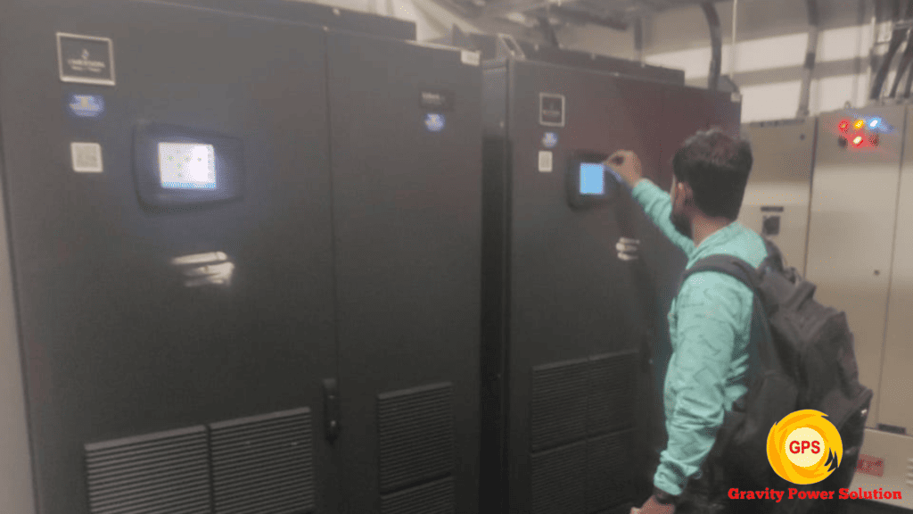 UPS service engineer providing onsite inspection and maintenance for industrial UPS systems